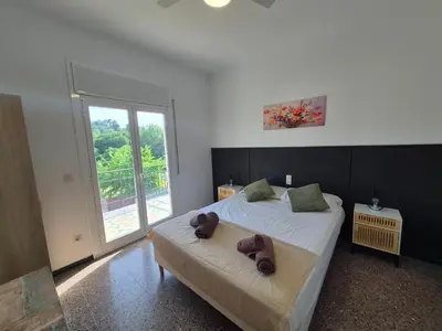Cama o camas de una habitación en Villa Begonia