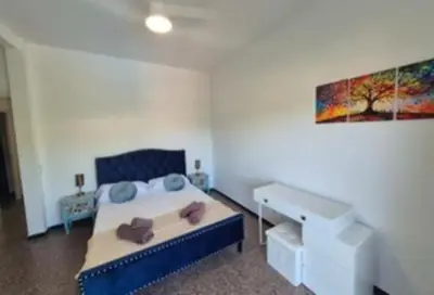 Cama o camas de una habitación en Villa Begonia