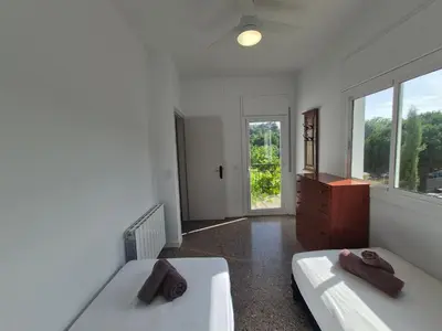 Cama o camas de una habitación en Villa Begonia