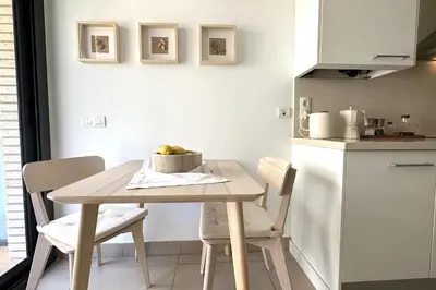 Una cocina o zona de cocina en LETS HOLIDAYS APARTMENT with POOL in QUIET AREA