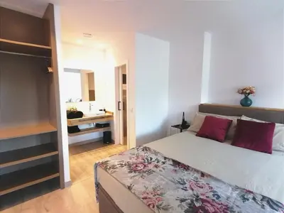 Cama o camas de una habitación en Central 2 bedroom apartment with terrace