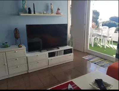 Una televisión o centro de entretenimiento en apartamento con fantásticas vistas