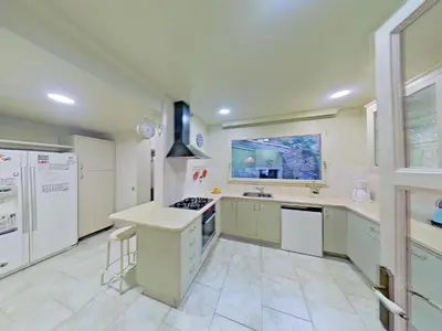 Una cocina o zona de cocina en Premium Habitat Les Villes