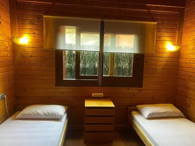 Cama o camas de una habitación en Villa Wood Dreams – Villa de madera en Calonge, con jacuzzi y piscina privada - ES-209-95