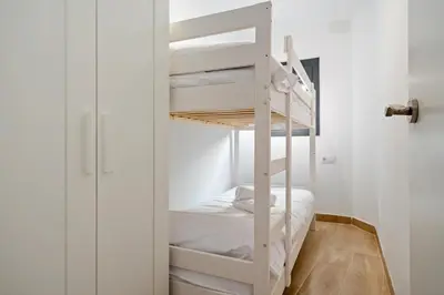 Cama o camas de una habitación en Hauzify I Casa El Rebost