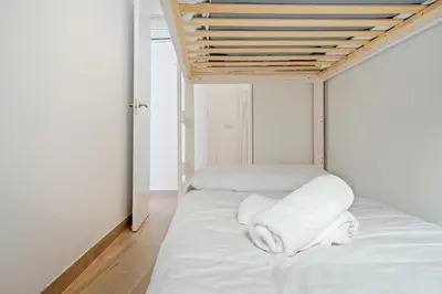 Cama o camas de una habitación en Hauzify I Casa El Rebost