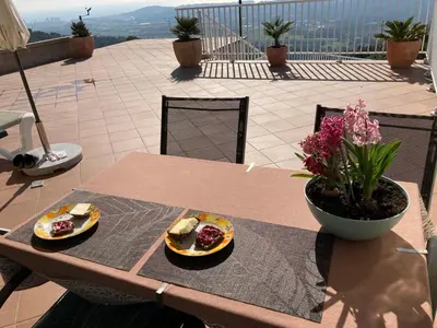 Un balcón o terraza de Holiday Home Gemütliches Ferienhaus mit Pool und Meerblick by Interhome
