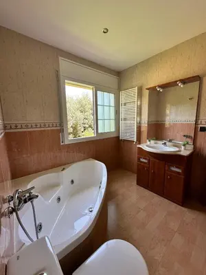 Un baño de Seahomes Vacations - Charming House with Private Pool