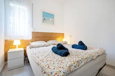 Cama o camas de una habitación en Hauzify I Mar Blanc