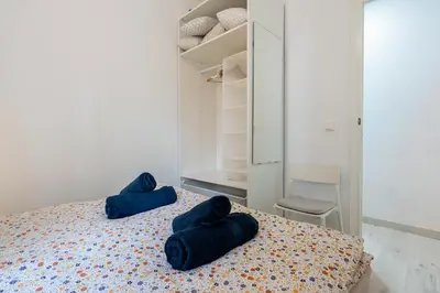 Cama o camas de una habitación en Hauzify I Mar Blanc