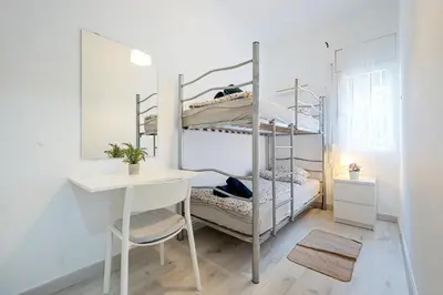 Cama o camas de una habitación en Hauzify I Mar Blanc