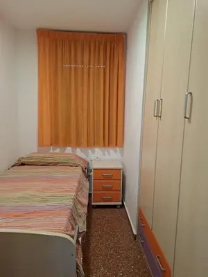 Cama o camas de una habitación en Voramar, Apartamento a primera línea de mar y con piscina