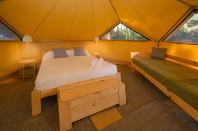 Cama o camas de una habitación en El Glamp Internacional Palamos