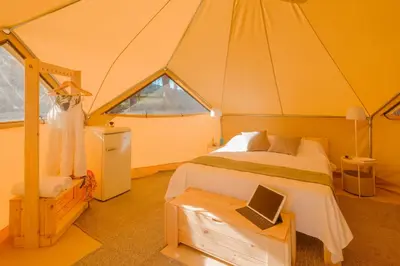Cama o camas de una habitación en El Glamp Internacional Palamos
