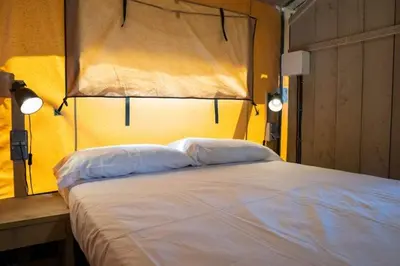 Cama o camas de una habitación en El Glamp Internacional Palamos
