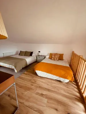 Cama o camas de una habitación en Alojamiento Rural Montseny
