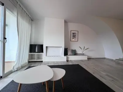 Una televisión o centro de entretenimiento en Casa Encina - Kerstin Bruns