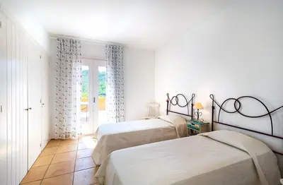 Cama o camas de una habitación en Large vacation home in Sa Tuna, 6 bedrooms