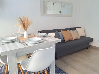 Zona de estar de Apartamento tipo estudio con piscina en Blanes