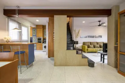 Zona de estar de Casa con plaza de parking