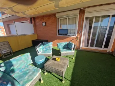 Zona de estar de Acogedor apartamento a tres minutos de la playa