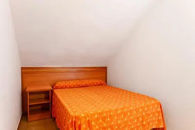 Cama o camas de una habitación en Santa Susanna Resort Affiliated by FERGUS