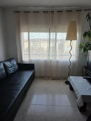 Zona de estar de Room in shared apartment