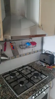 Una cocina o zona de cocina en Room in shared apartment