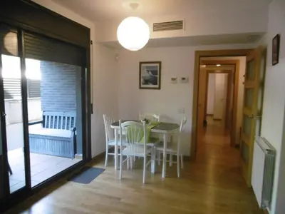 Zona de estar de Amplio apartamento con piscina y aire acondionado