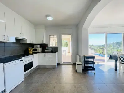 Una cocina o zona de cocina en La Palmeraie by Costabravaway