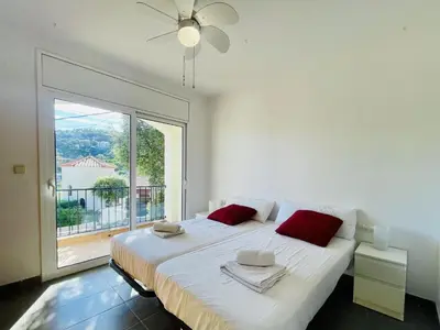 Cama o camas de una habitación en La Palmeraie by Costabravaway