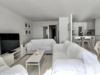 Una televisión o centro de entretenimiento en EVH118 Apartamento en primera linea