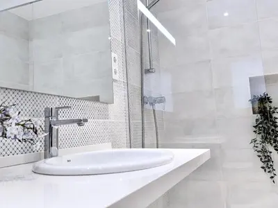 Un baño de EVH118 Apartamento en primera linea