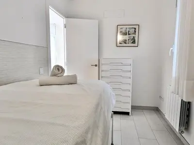 Cama o camas de una habitación en EVH118 Apartamento en primera linea