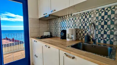 Una cocina o zona de cocina en EVH122 Apartamento con vistas al mar