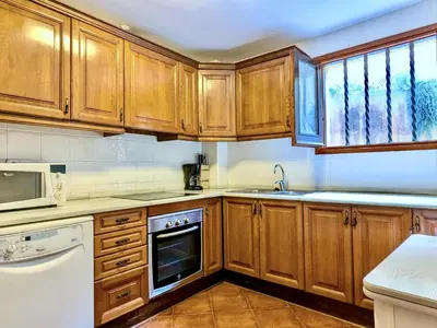 Una cocina o zona de cocina en EVH123 Casa adosada con piscina comunitaria