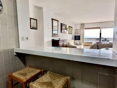 Zona de estar de EVH124 Apartamento en primera linea de mar