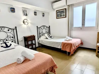 Cama o camas de una habitación en EVH124 Apartamento en primera linea de mar