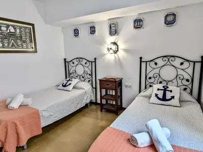 Cama o camas de una habitación en EVH124 Apartamento en primera linea de mar