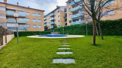 Piscina en o cerca de EVH127 Bajo con terraza y piscina comunitaria