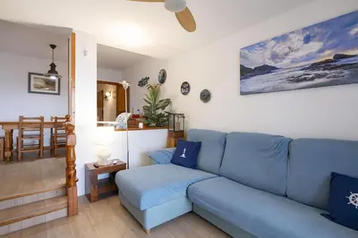 Zona de estar de Apartamento con vistas al mar y piscina en Platja d'Aro