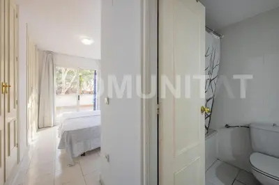 Cama o camas de una habitación en Apartamento con piscina y aparcamiento en Playa de Aro