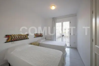 Cama o camas de una habitación en Apartamento con piscina y aparcamiento en Playa de Aro