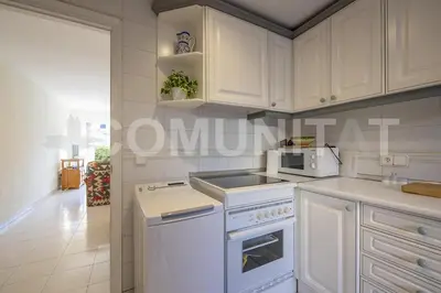 Una cocina o zona de cocina en Apartamento céntrico con piscina y aparcamiento