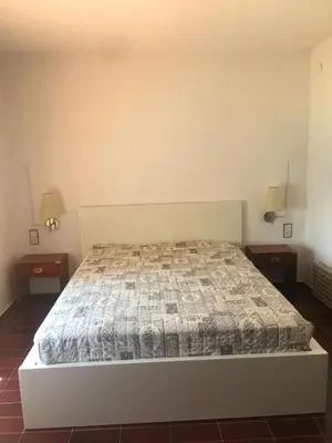 Cama o camas de una habitación en Ático con vistas al mar en Platja d'Aro