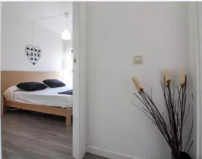 Cama o camas de una habitación en VILLAS COSETTE Apartamento NEPTUNO 417