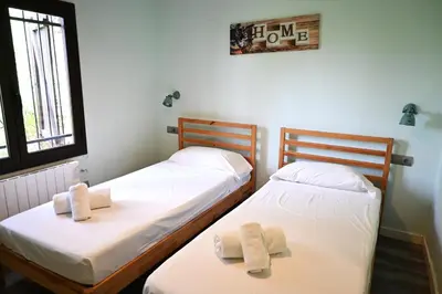 Cama o camas de una habitación en Homenfun Costa Brava Begur Villa