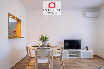 Una televisión o centro de entretenimiento en Apartament Marea Baixa