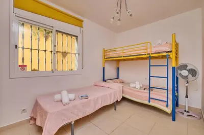Cama o camas de una habitación en Villa Sol y Mar - Lloret de Mar