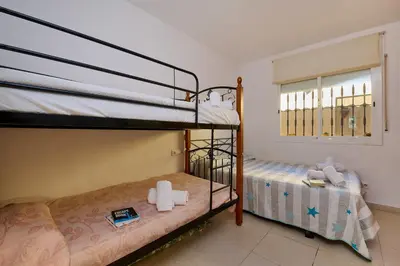 Cama o camas de una habitación en Villa Sol y Mar - Lloret de Mar